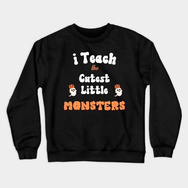 I Teach The Cutest Little Monster Crewneck Sweatshirt by The Studio Style